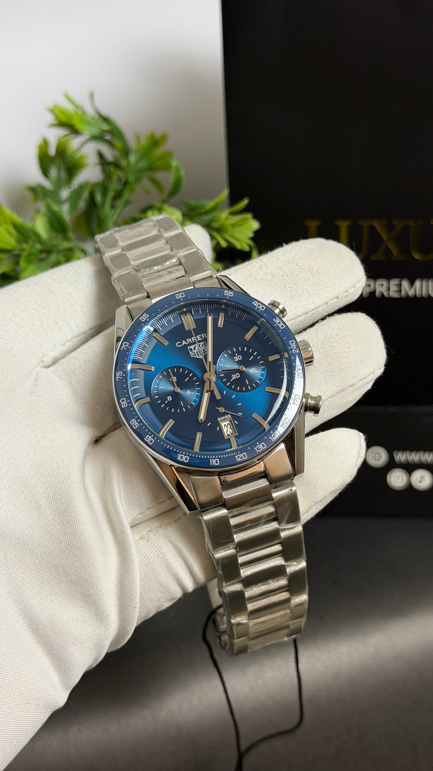 Silver with Blue Dial.