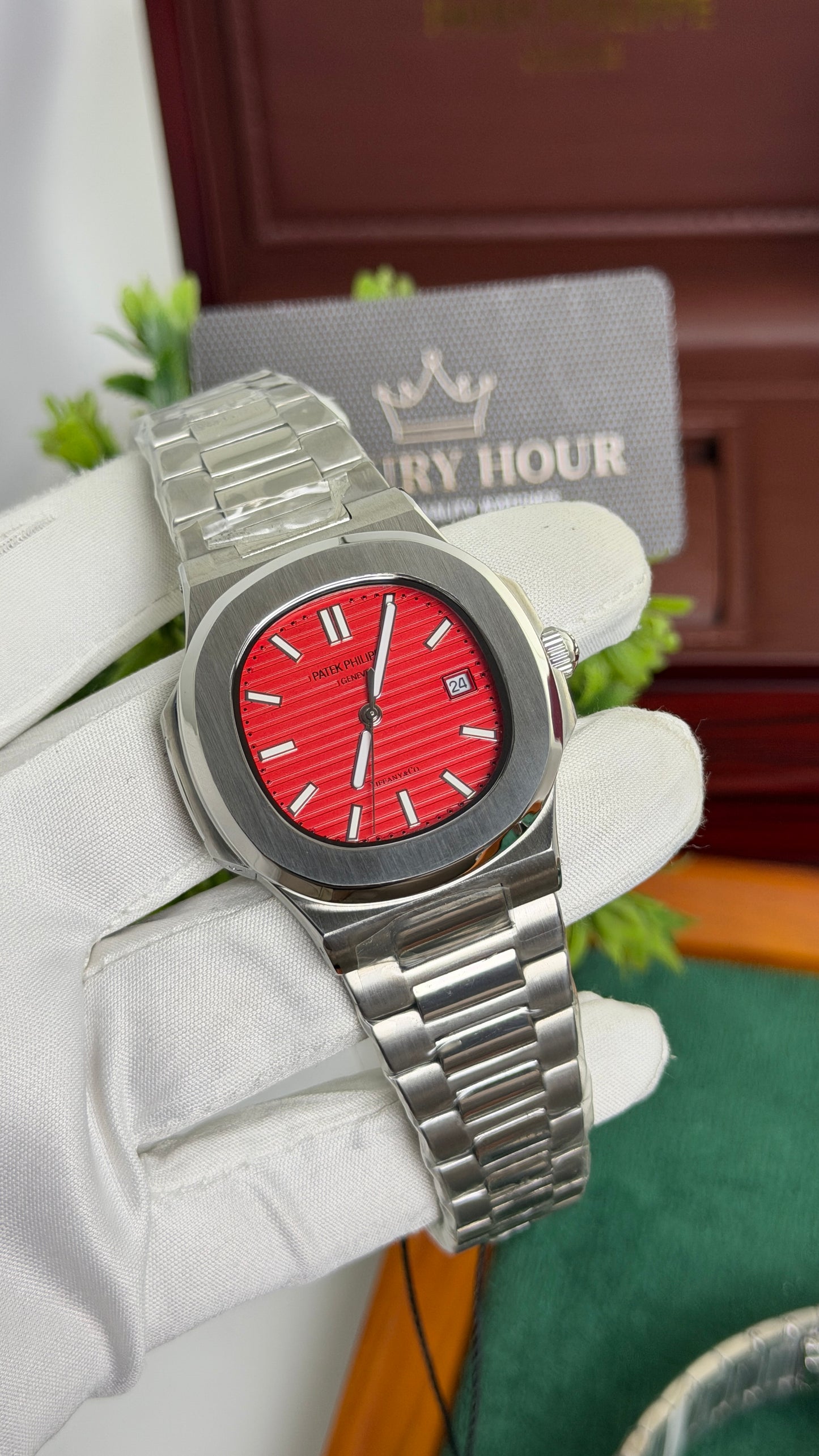 Silver with Red Dial.