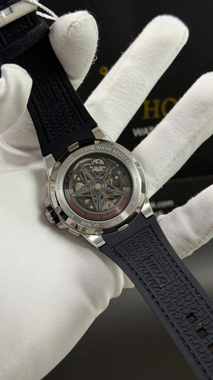 Silver with Black Skeleton Dial.( 100% Original )