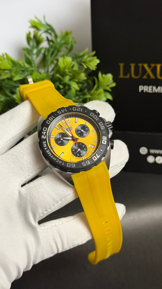 Silver with Yellow Dial.
