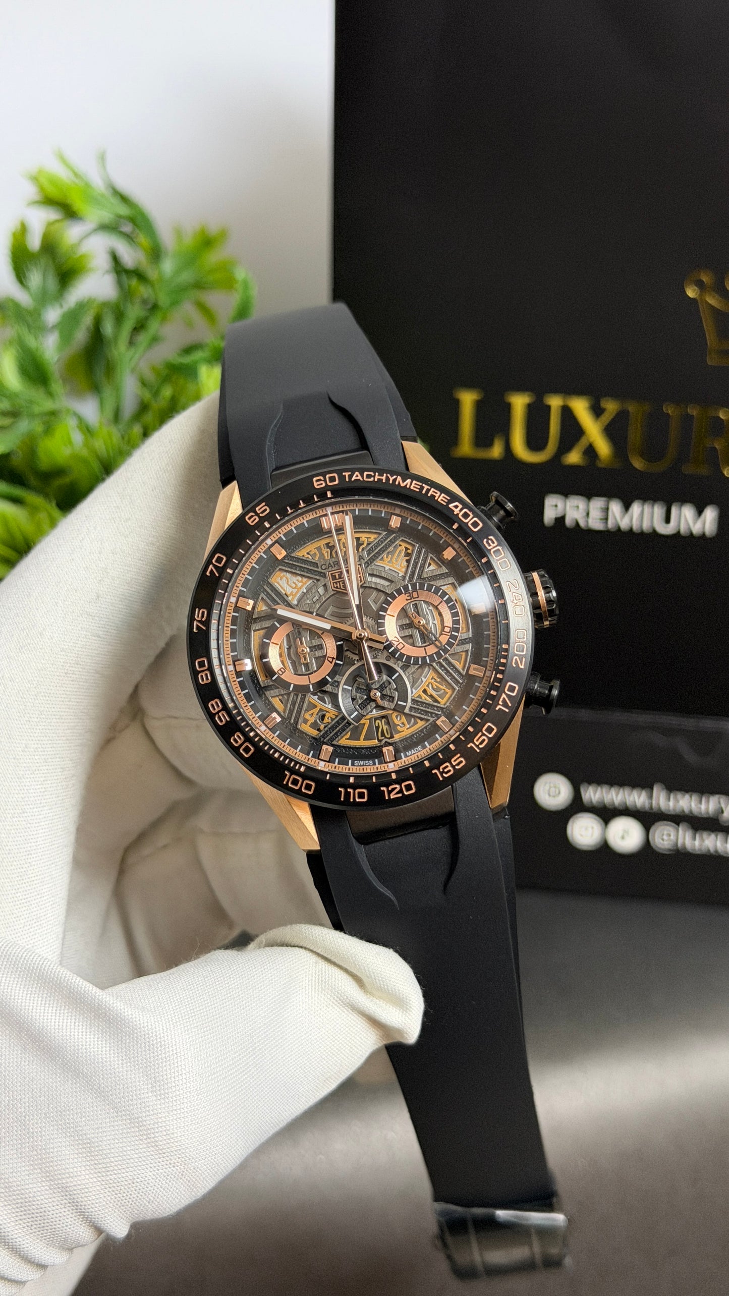 Rose Gold with Black Dial.
