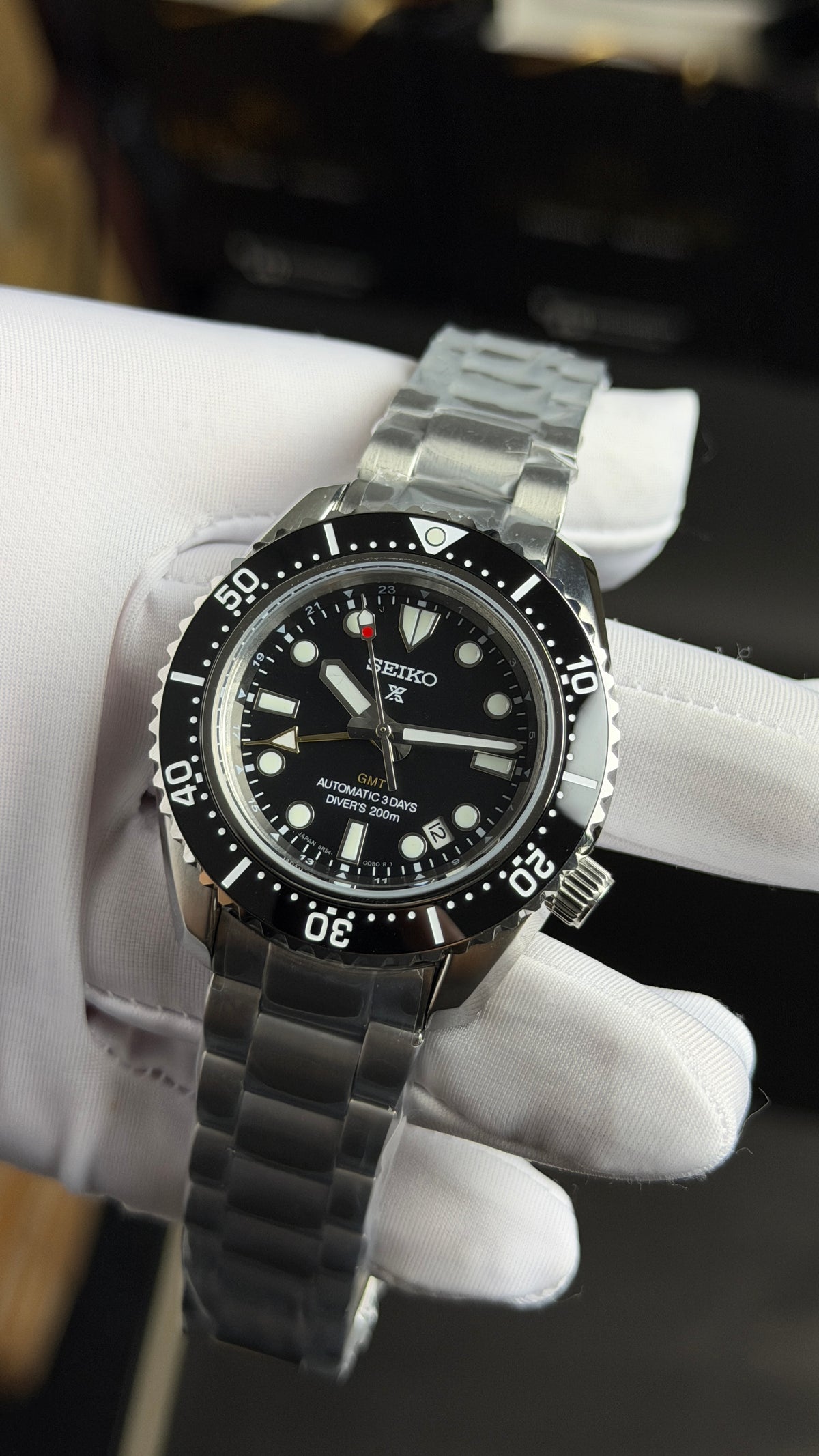Silver with Black Dial.