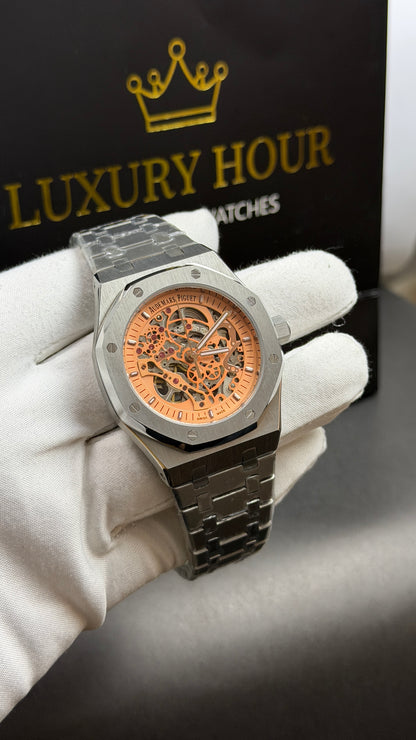 Silver with Orange Skeleton Dial.