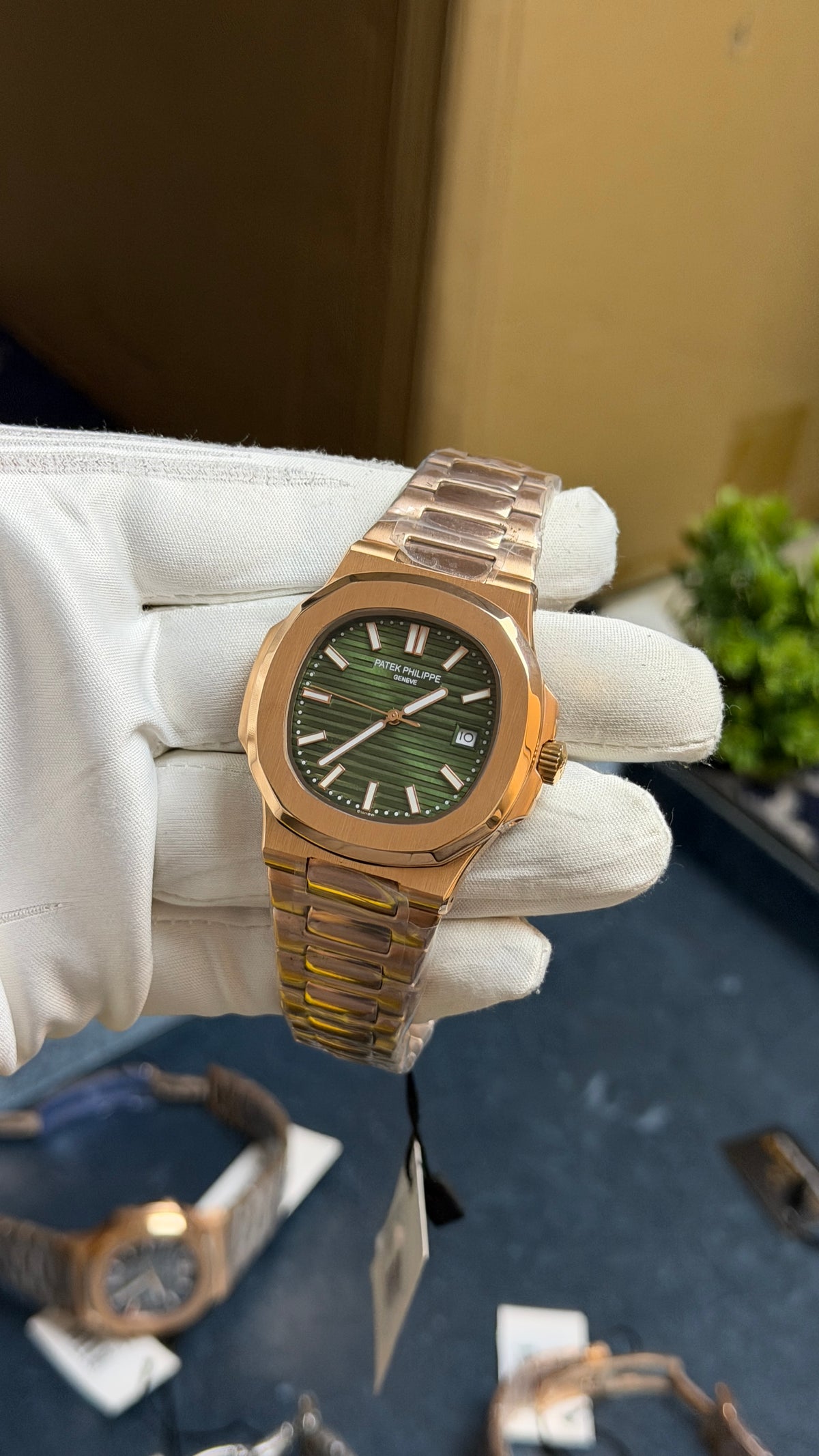 Rose Gold with Green Dial.