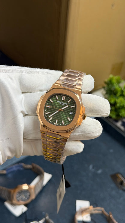 Rose Gold with Green Dial.