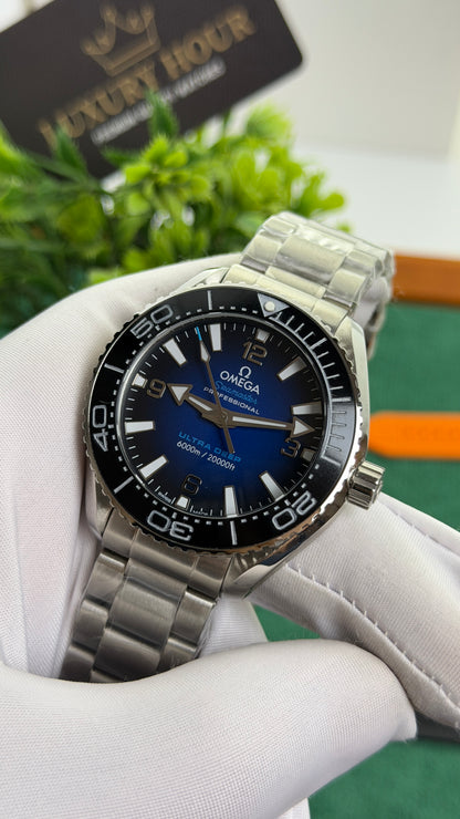 Silver with Blue Dial.