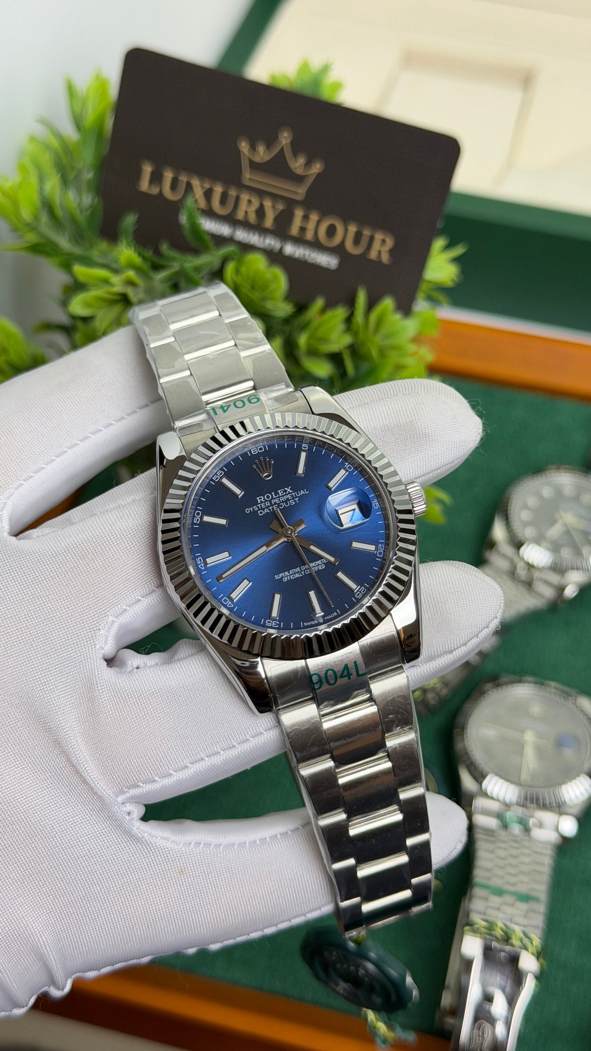 Silver with Blue Dial.
