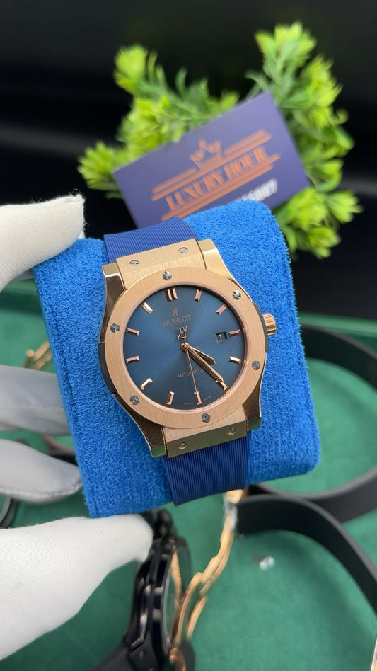 Rose gold with blue dial