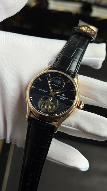 Rose Gold with Black Dial.