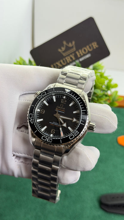 Silver with Black Dial.
