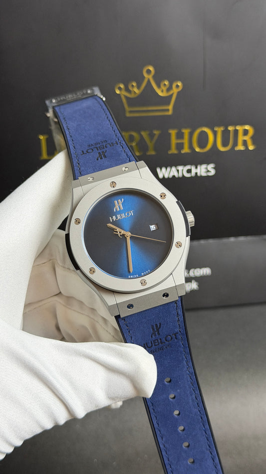 Silver with Blue Dial.