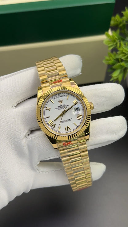 Yellow gold with white dial