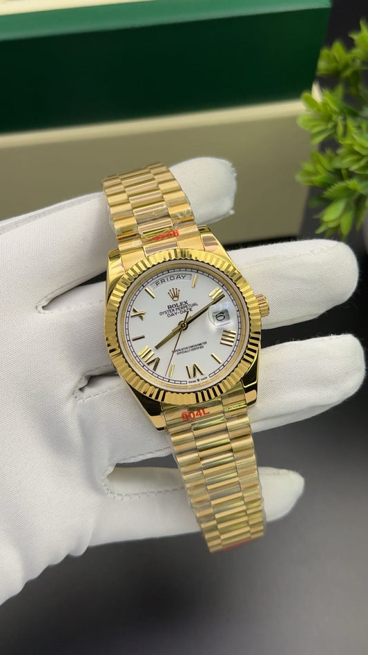 Yellow gold with white dial