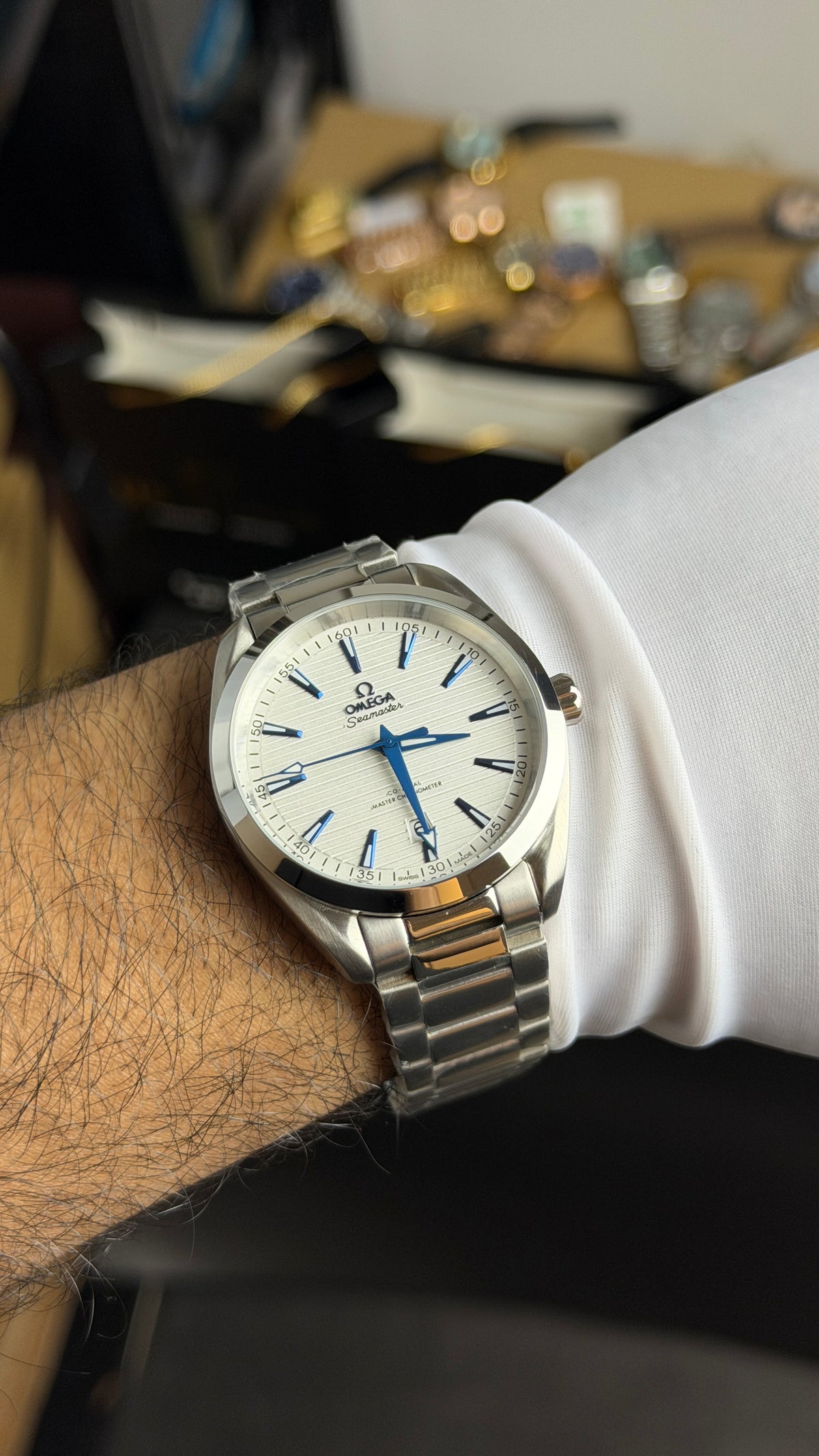 Silver with White Dial.