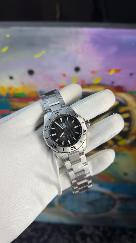 Silver with dark grey dial