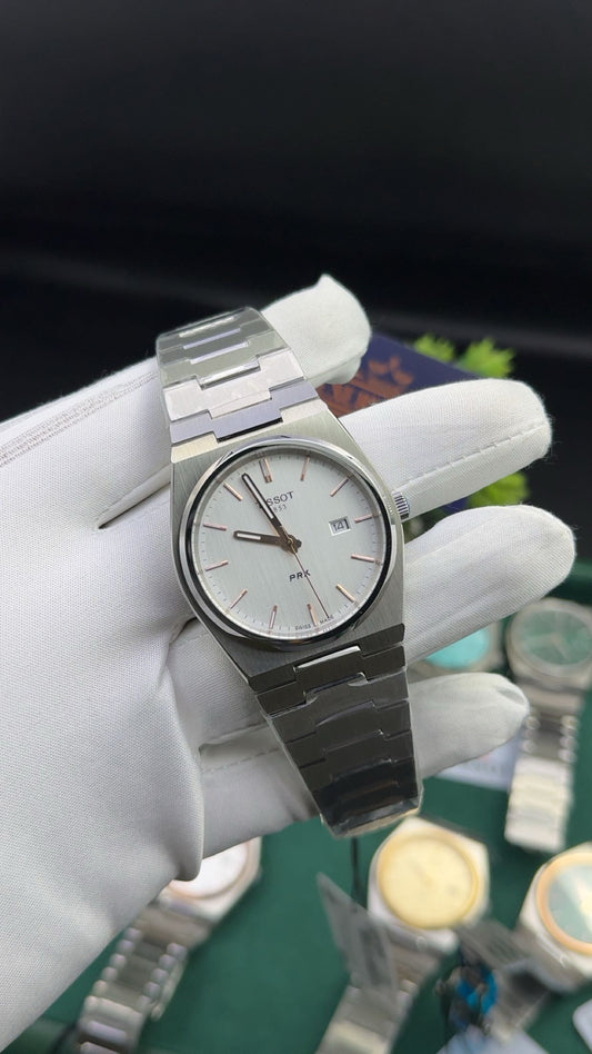 Silver with white dial