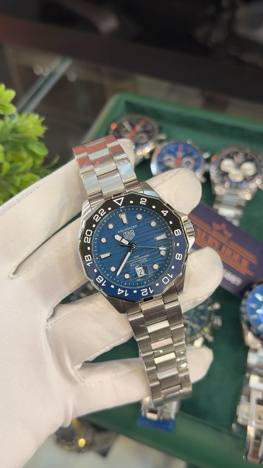 Silver with blue dial