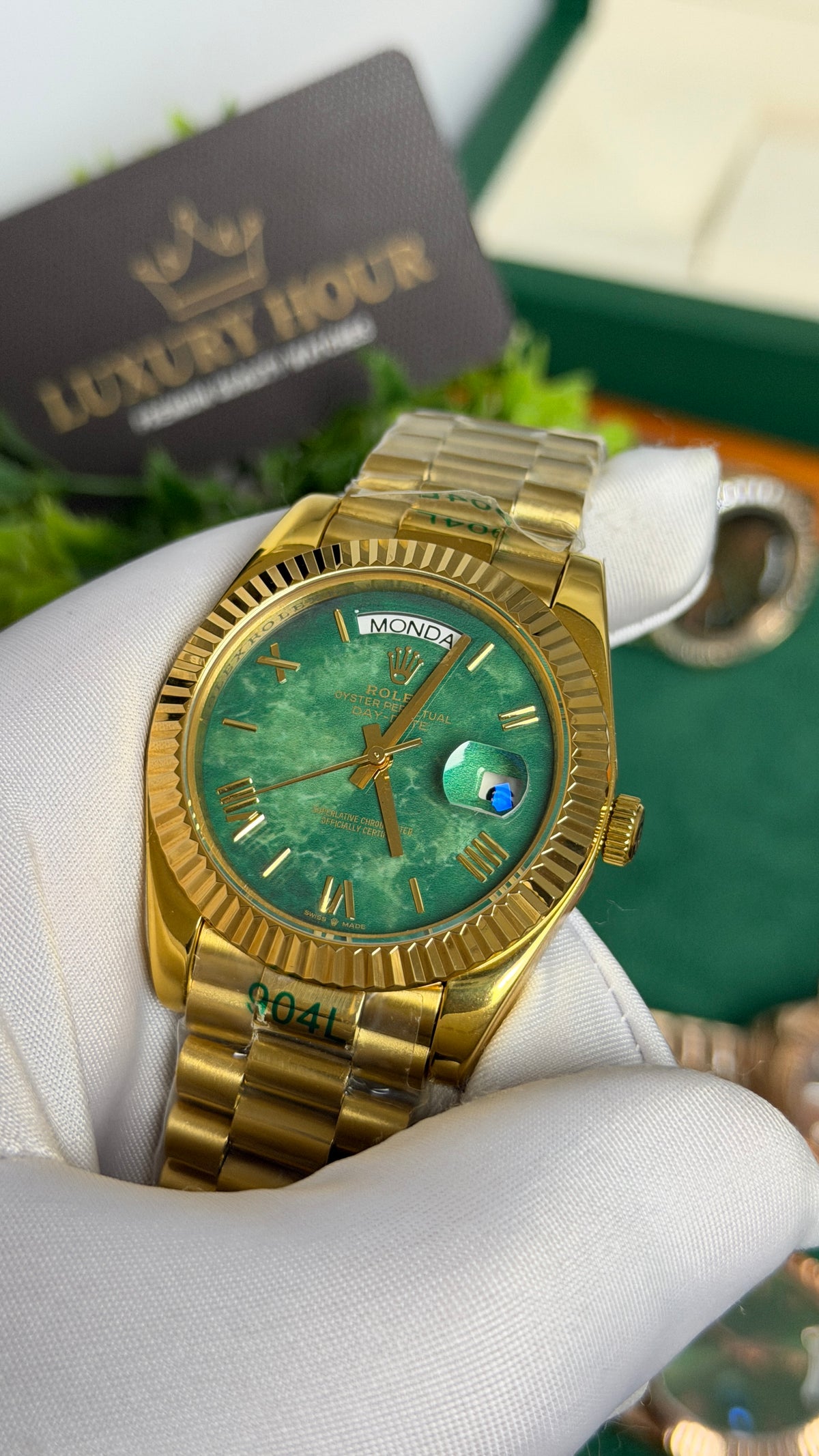 Yellow Gold with Green Marble Dial.