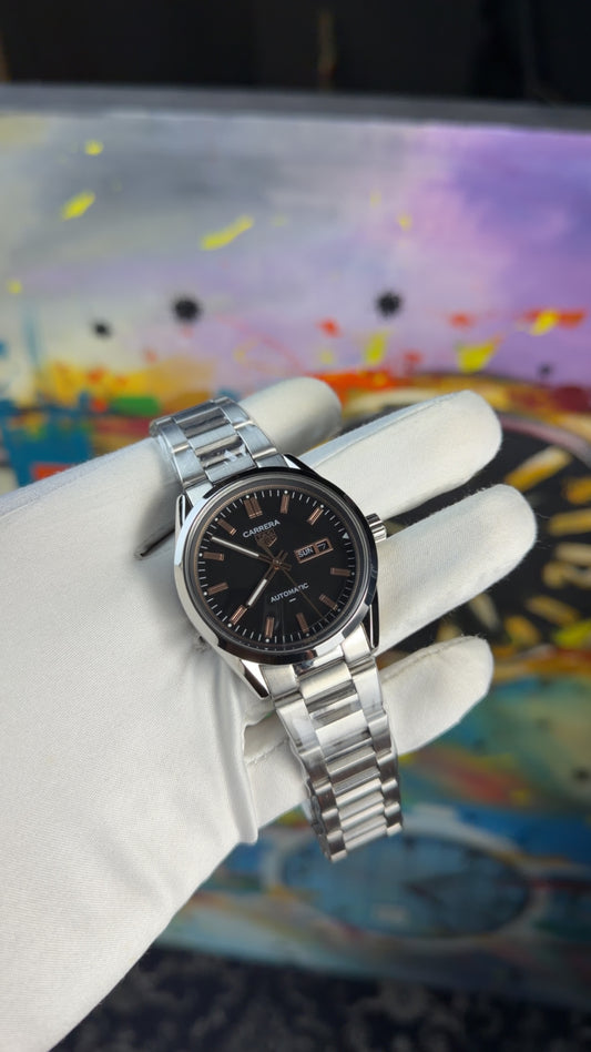 Silver with black dial