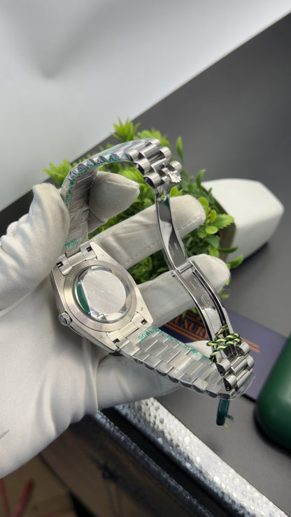 Silver with Green dial🔥