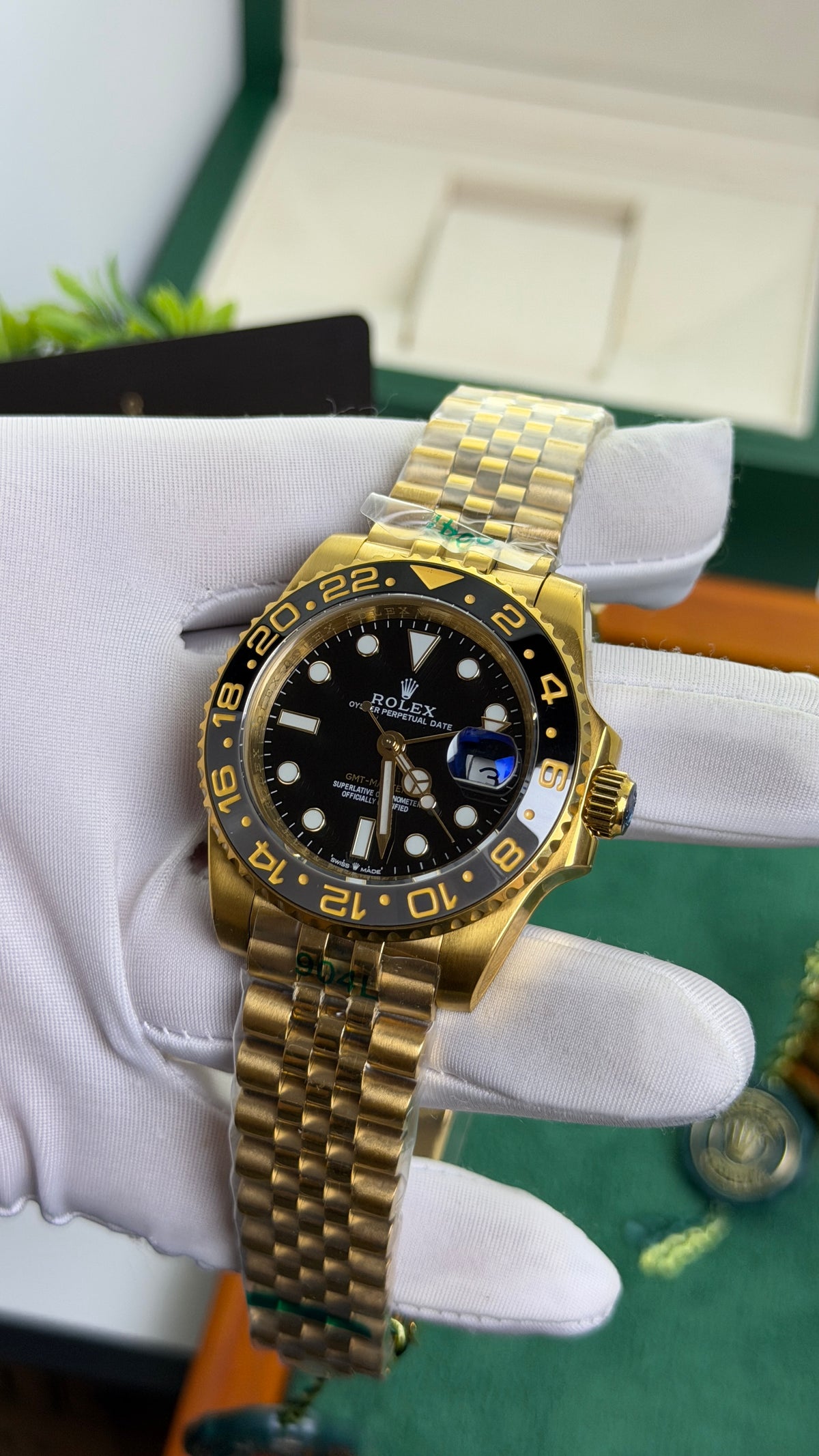 Yellow Gold with Black Dial.
