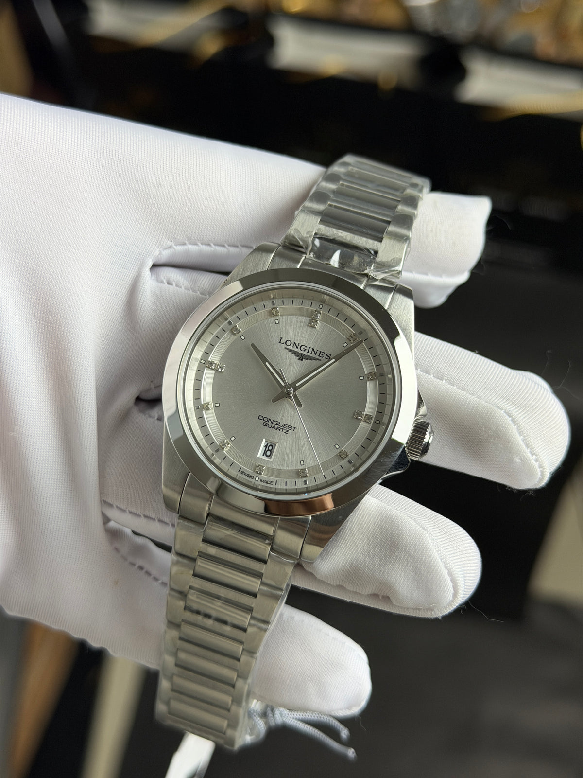 Silver with White Dial.