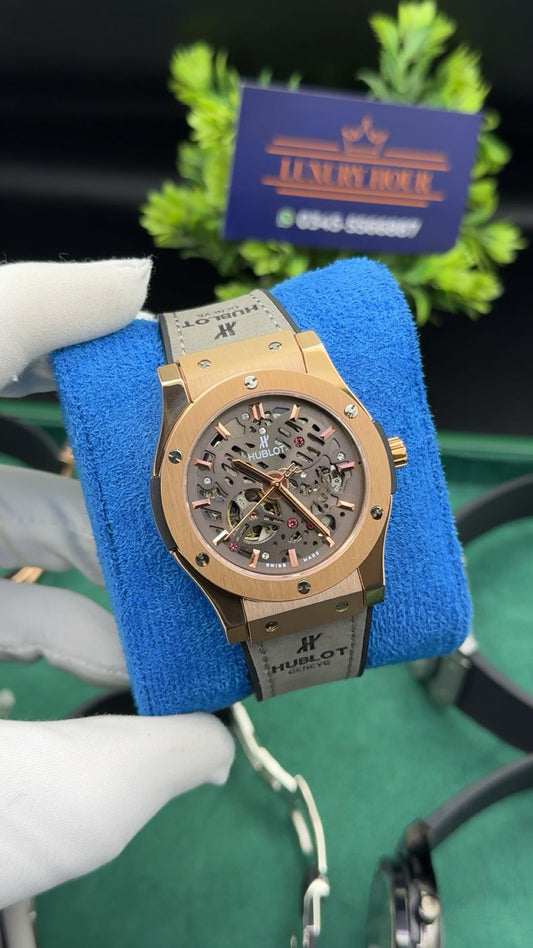 Rose gold with grey dial