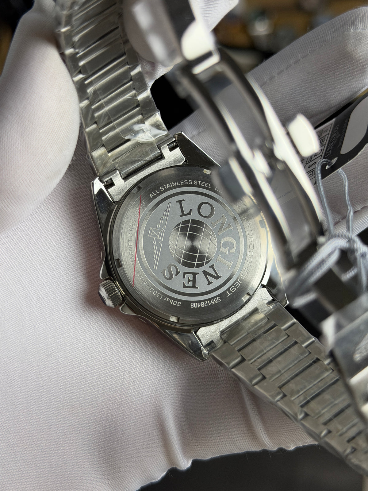 Silver with Green Dial.