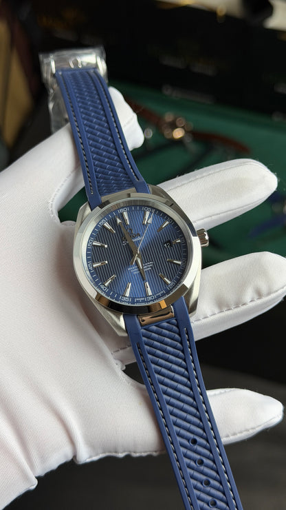 Silver with Aqua Dial.