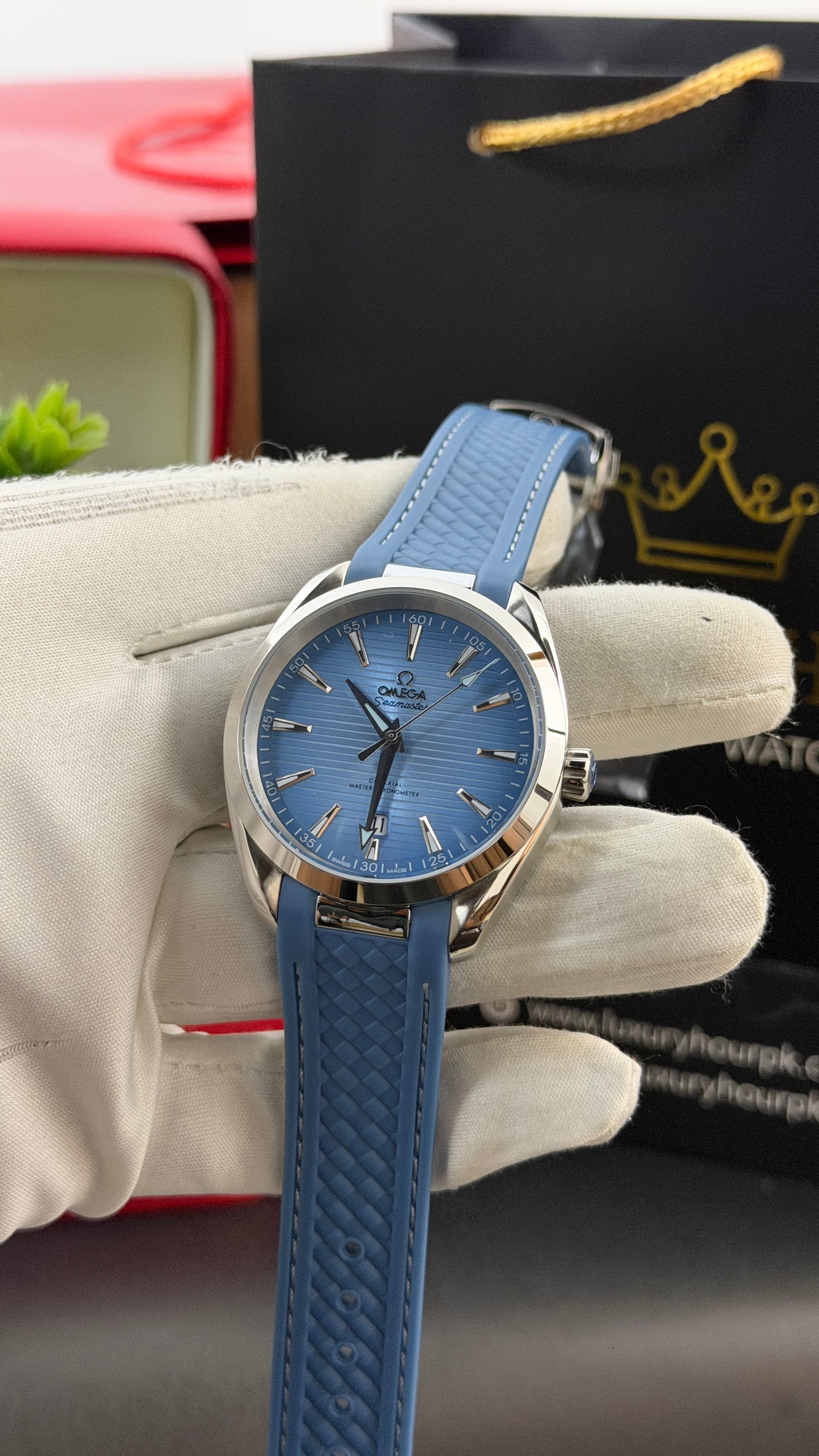 Silver with Sky Blue Dial.