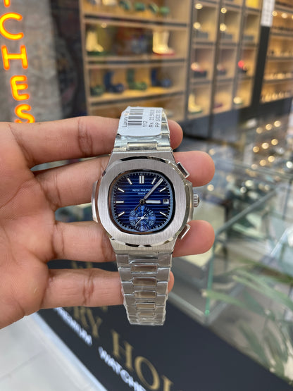 Silver with blue dial