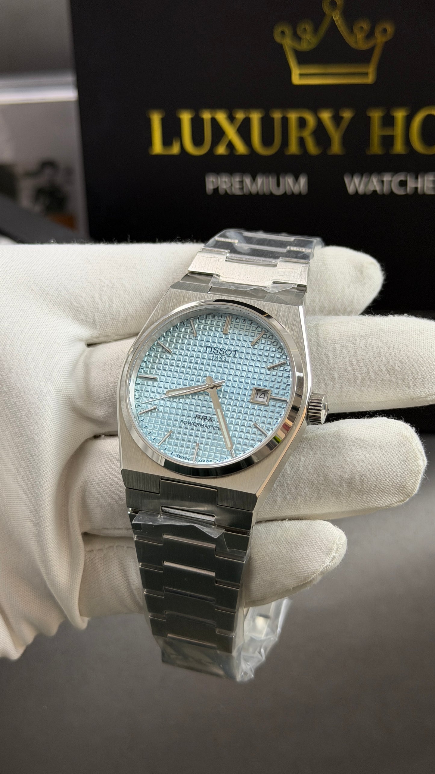 Silver with Blue Dial.