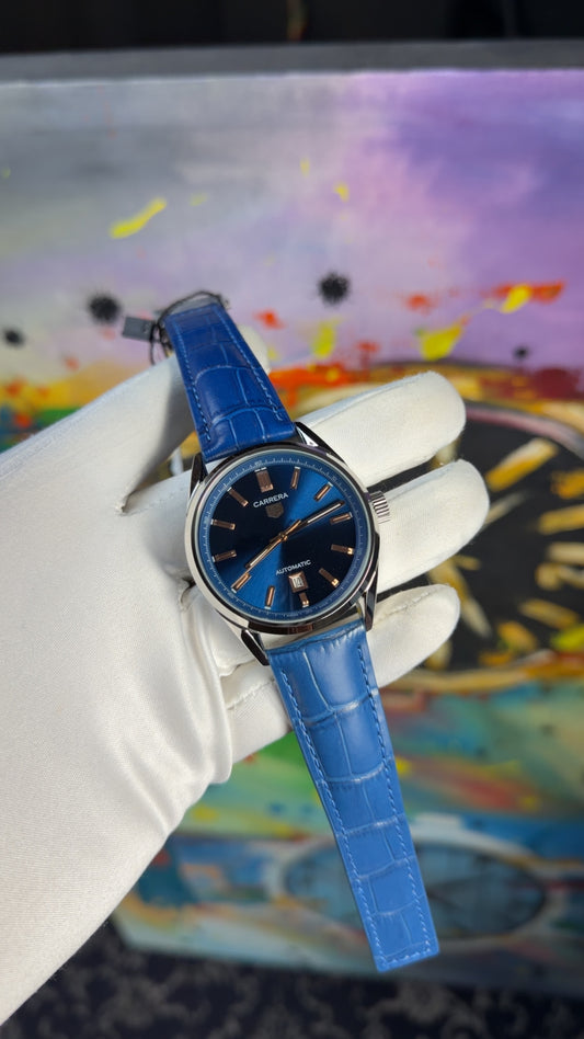 Silver with dark blue dial
