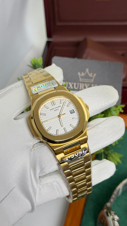 Yellow Gold with White Dial.