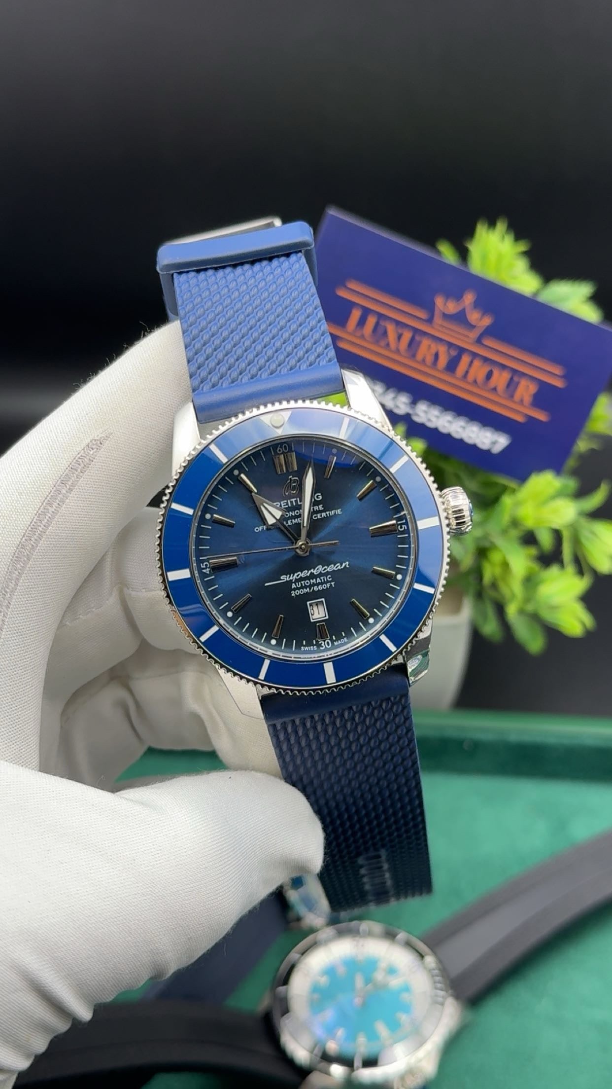 Silver with blue dial