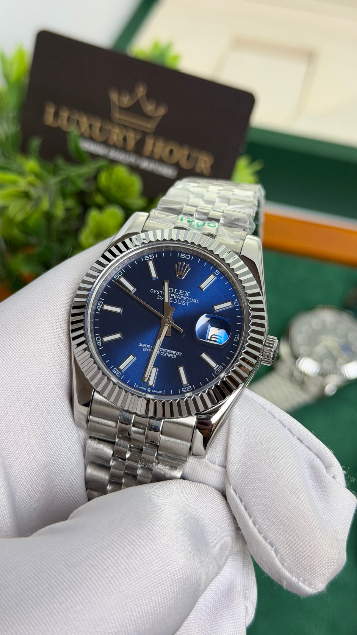 Silver with Blue Dial.