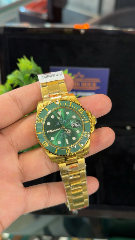 Yellow gold two tone with green dial