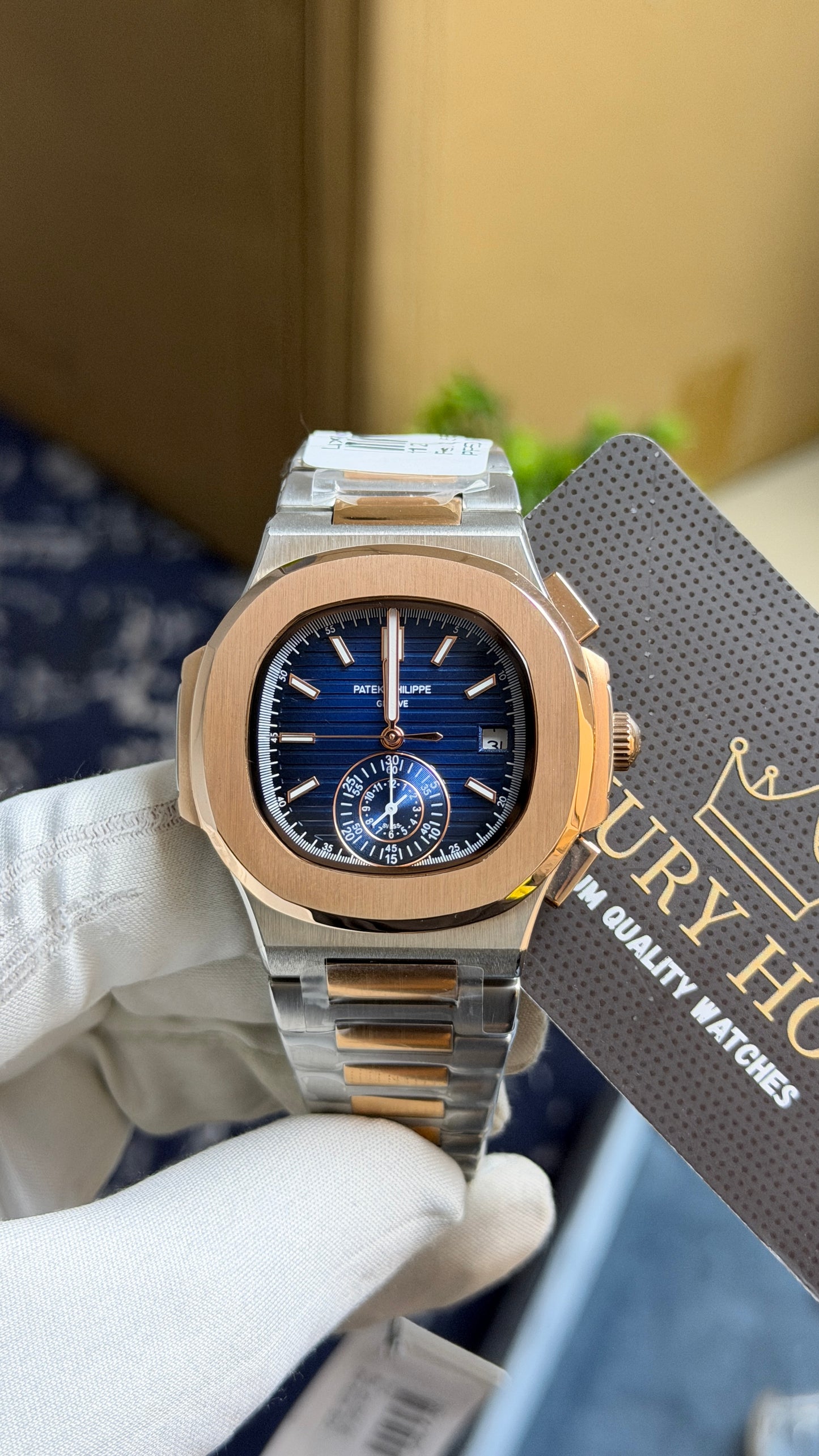 Rose Gold Two Tone with blue Dial.
