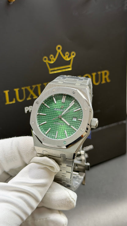 Silver with Green Dial.