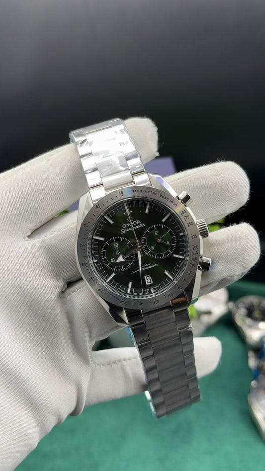 Silver with green dial
