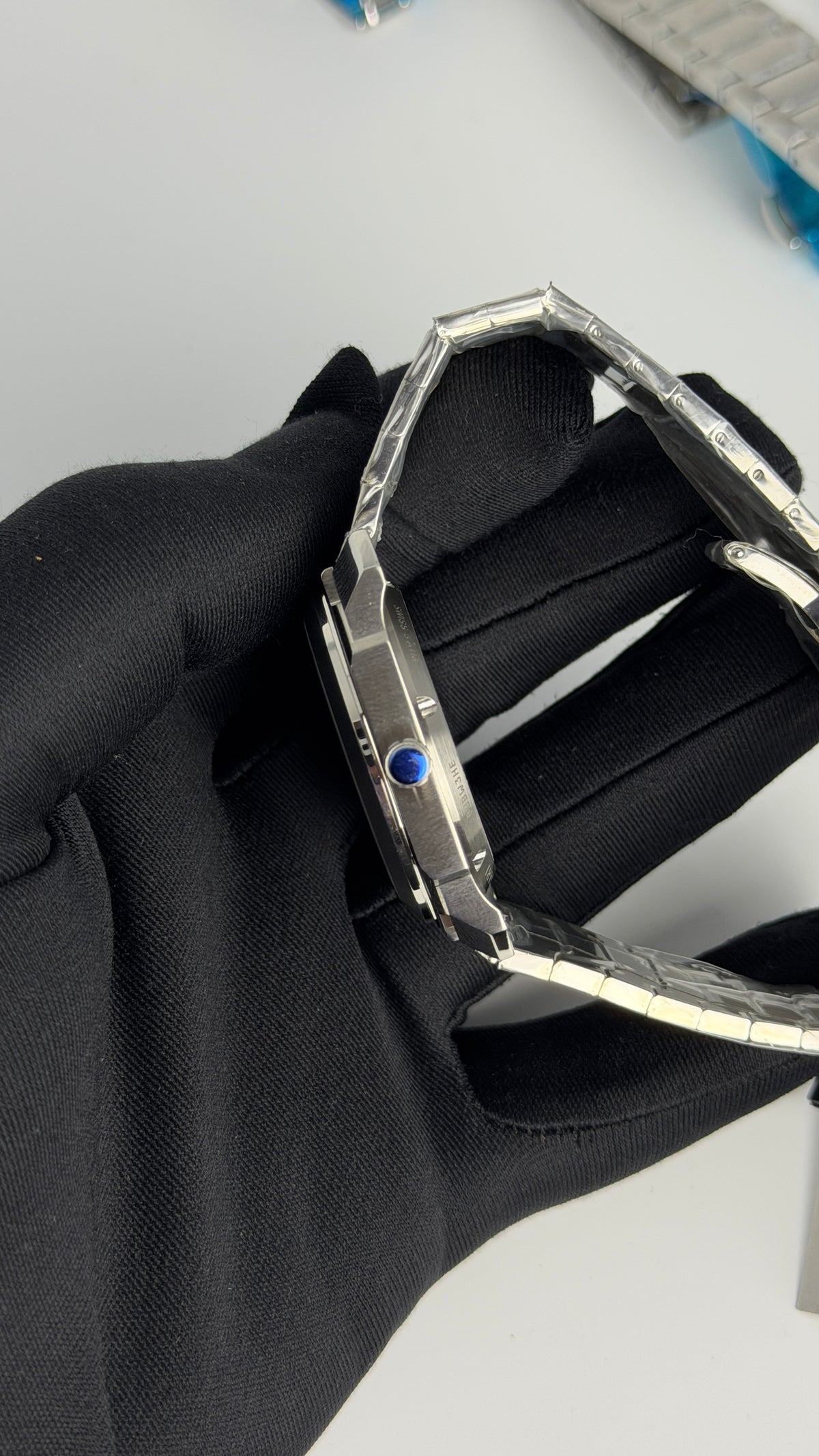 Silver with Aqua Dial.