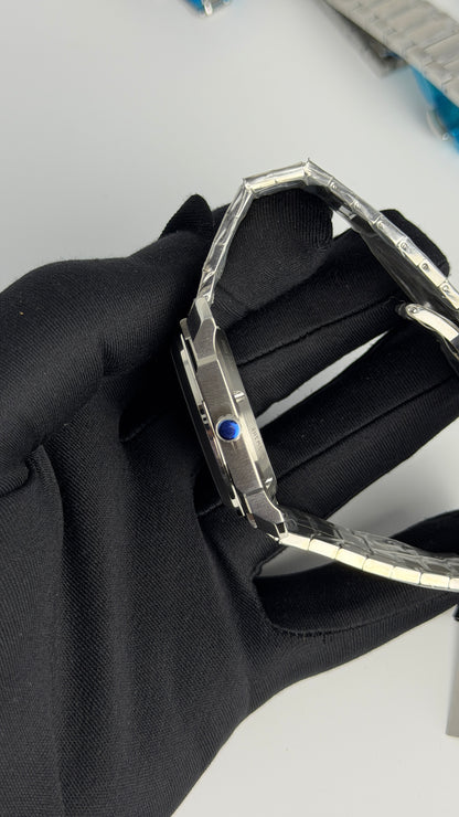 Silver with Aqua Dial.