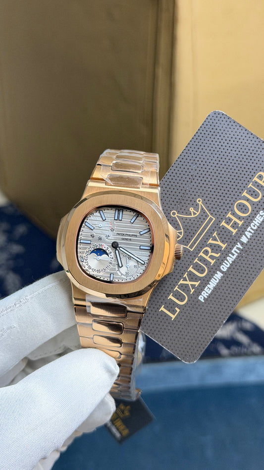 Rose Gold with White Dial.