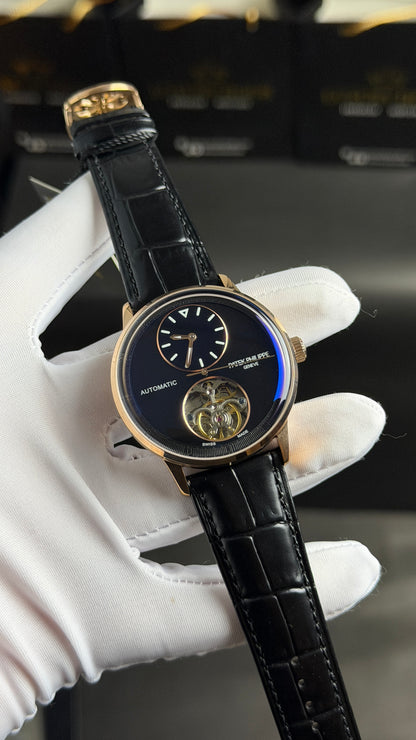 Rose Gold with Aqua Dial.