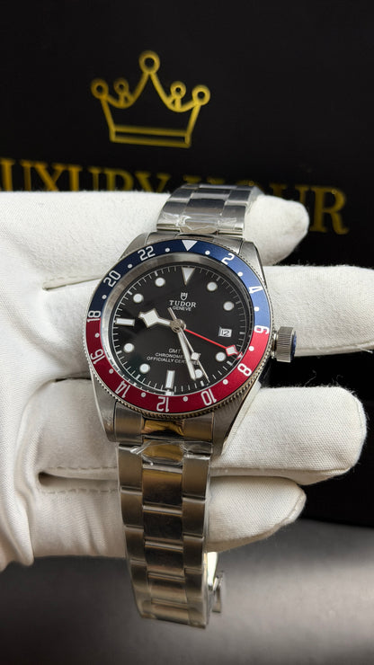 Silver with Black Dial.