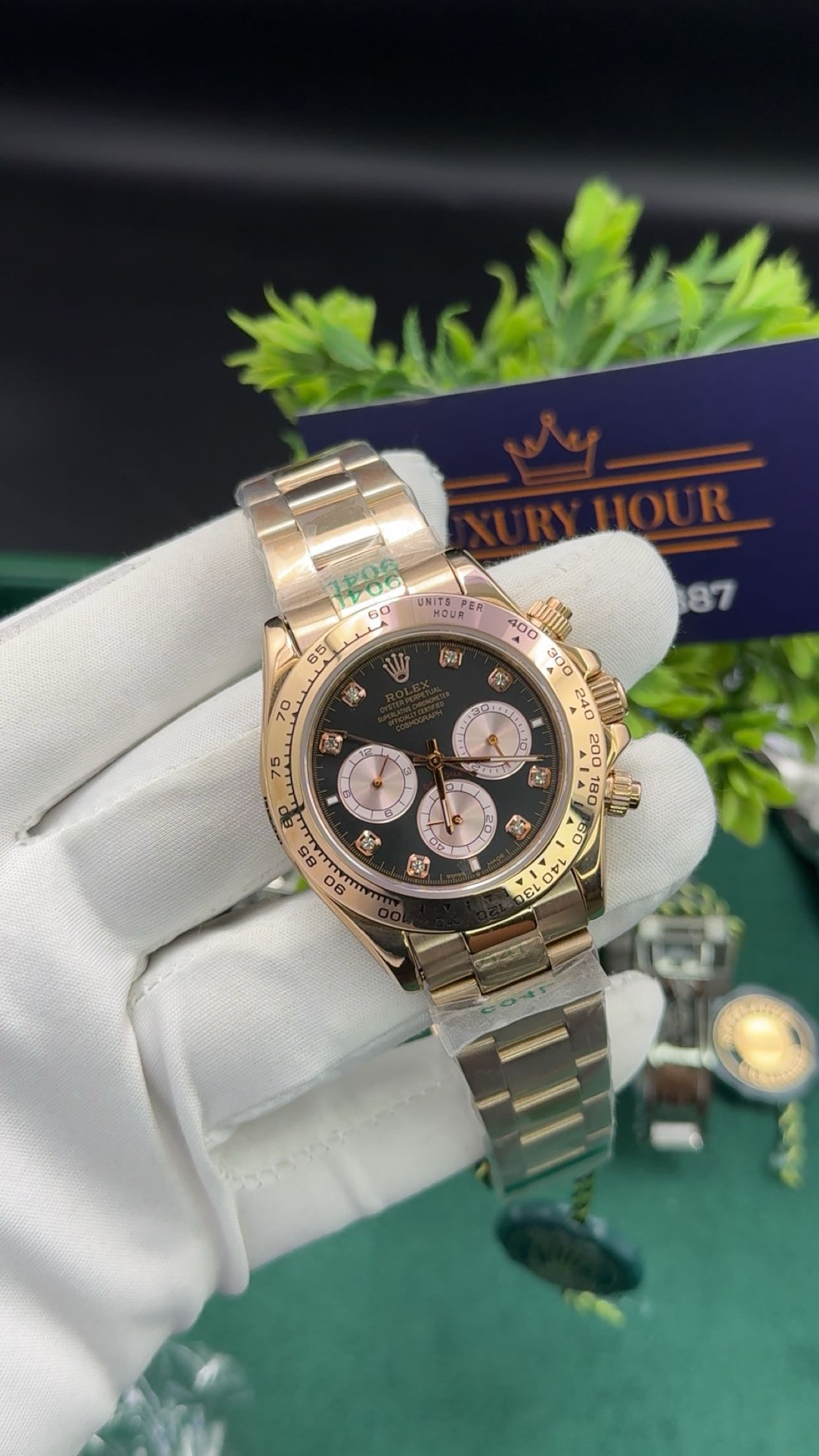 Rose gold with black dial