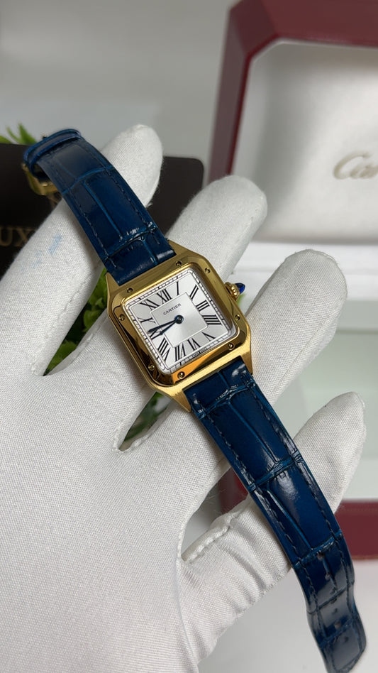 Yellow Gold with Blue Strap.