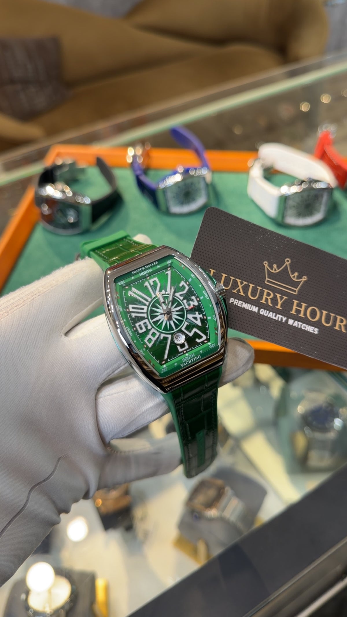 Silver with Green Dial.