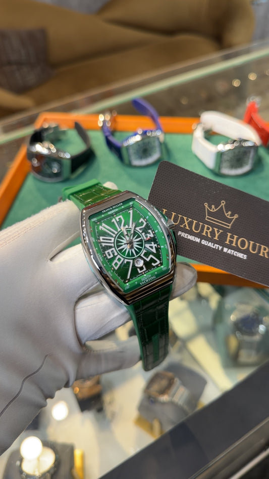 Silver with Green Dial.