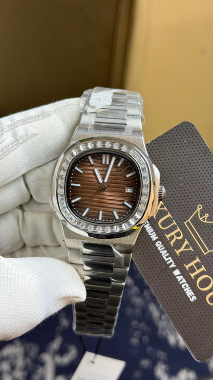 Silver with Chocolate Dial.